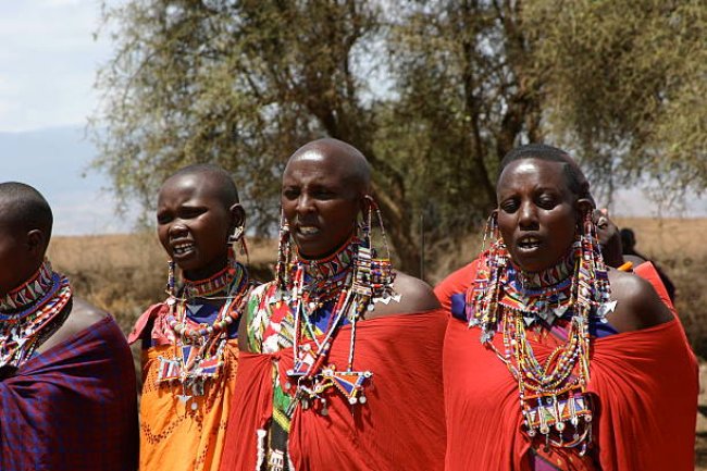 Maasai men and women in traditional attire